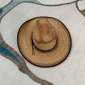Stylish Tan Straw Hat with Black Trim